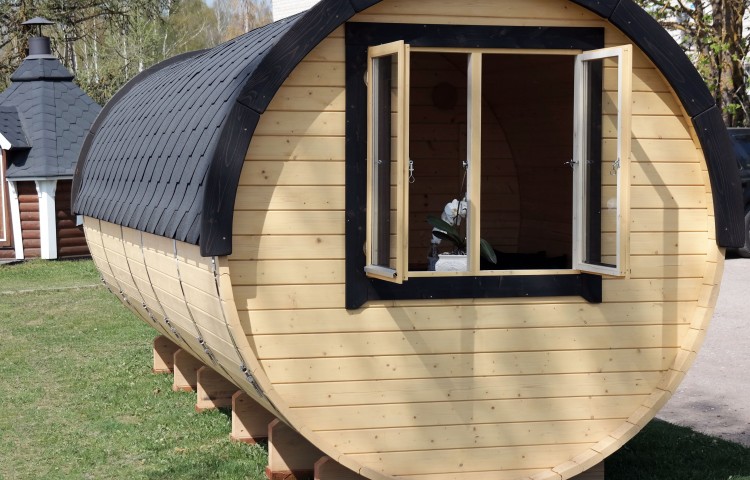 Sauna barrel with side entrance Double opening window in sitting room