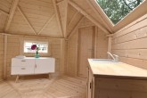 Partition wall between cabin and extension with door