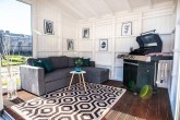 Terrace floor made from corrugated spruce wood with frame
